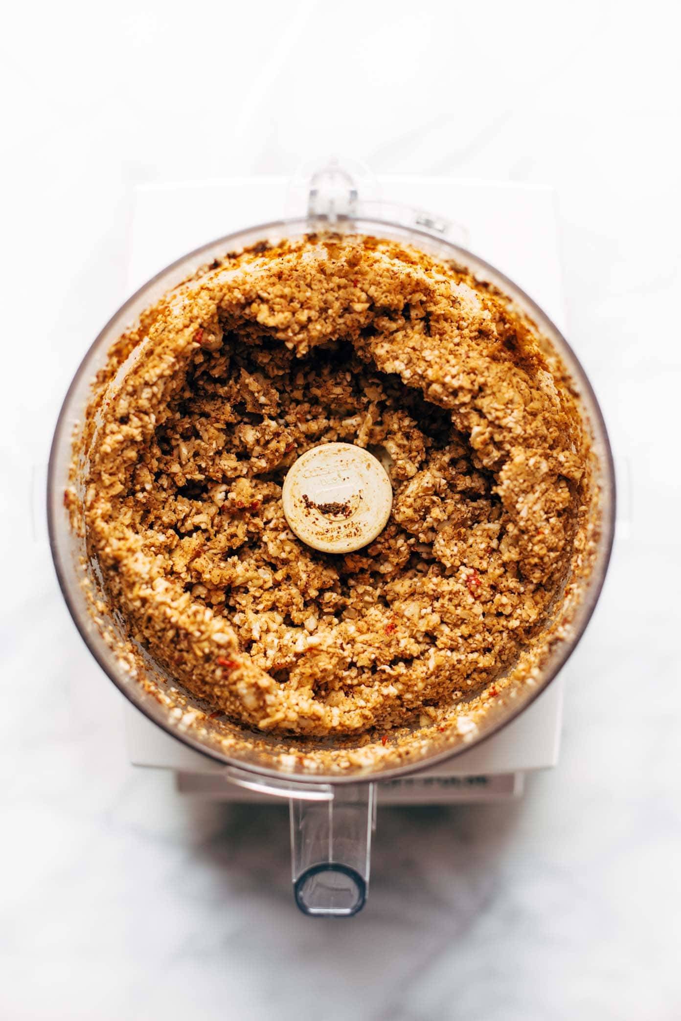 Spicy Cauliflower Walnut Taco Meat ingredients in a food processor.